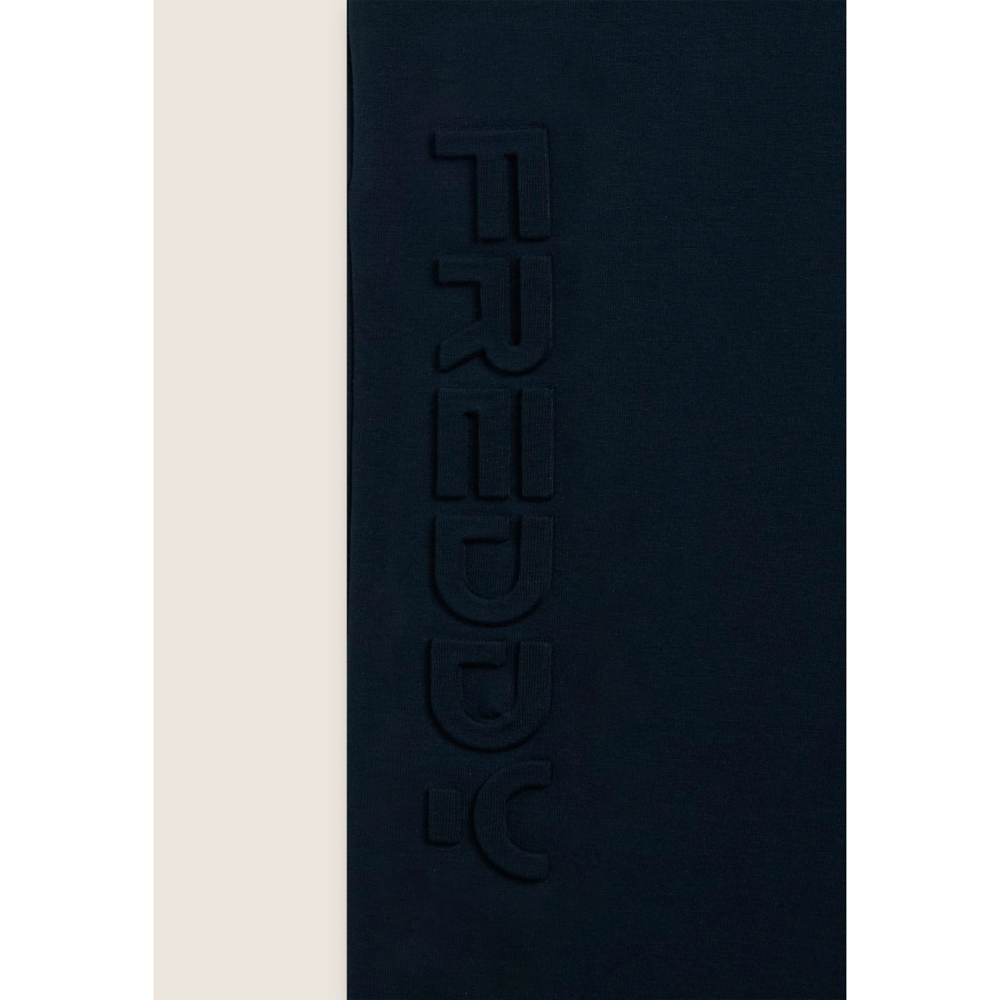 Pantaloni slim in interlock con maxi logo in rilievo