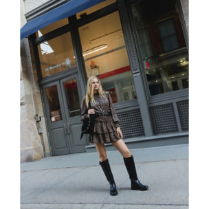 Mini falda estampada con nido de abeja y doble volante