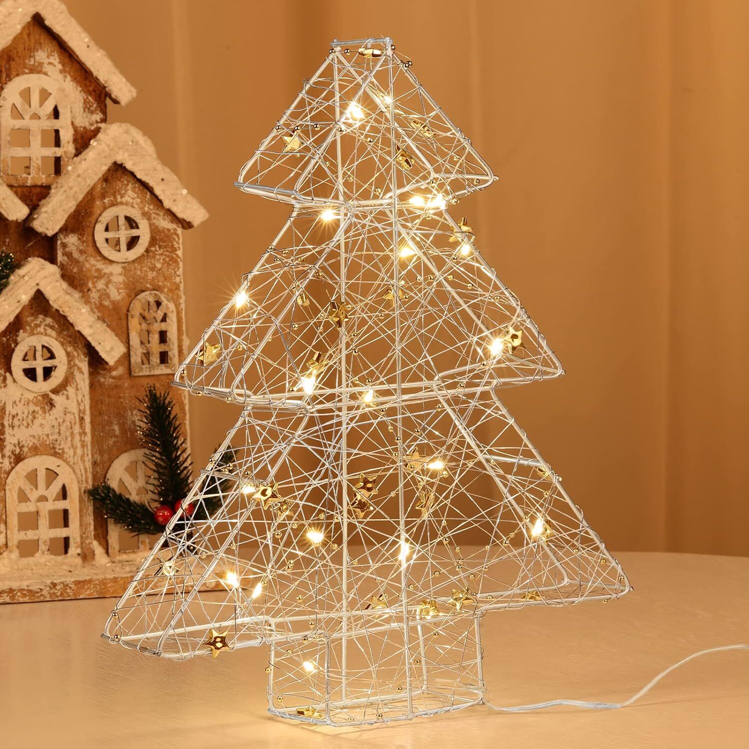 árbol navideño metálico dorado con 20 luces led blancas cálidad 21x4x30cm