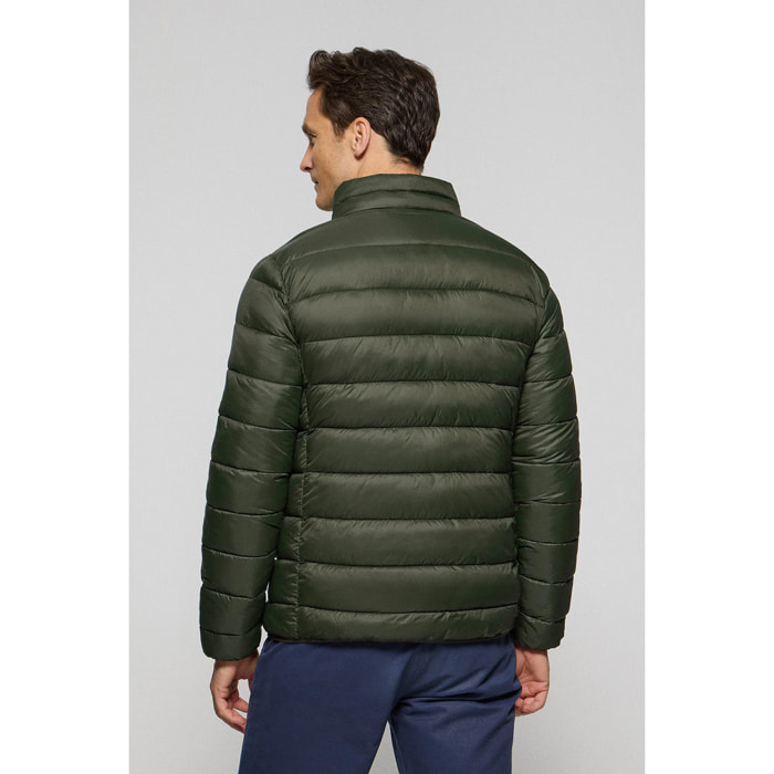 Chaqueta Chase ultralight verde oscuro con parche Rigby Go
