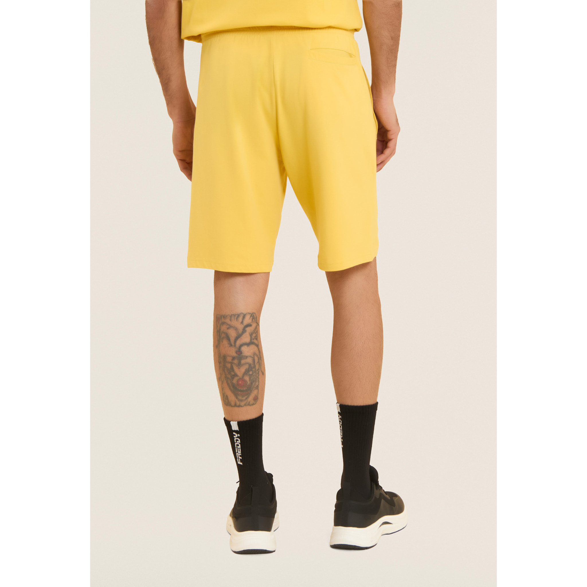 Pantaloni corti in jersey stretch con taschino