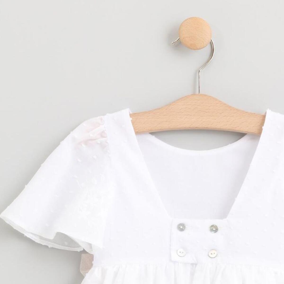 VESTIDO DE PLUMETI CON VOLANTES Y FALDA BORDADA CON LAZO