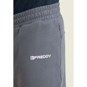 Pantaloni slim in interlock con dettagli lucidi