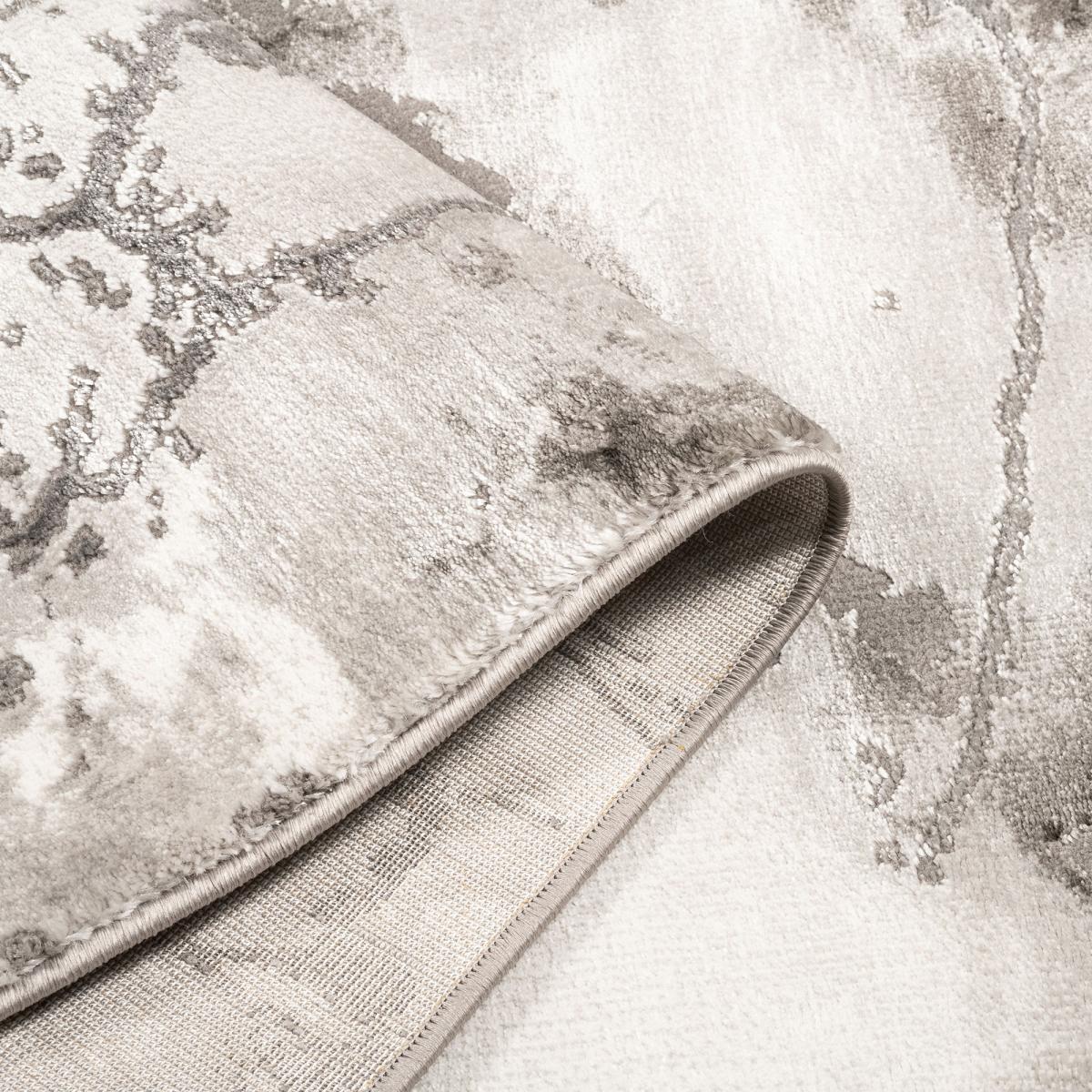 Tapis moderne TEba aux motifs abstraits gris