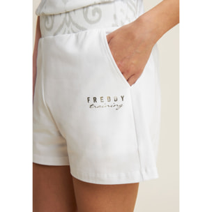 Short sportivi con fascia in vita floreale