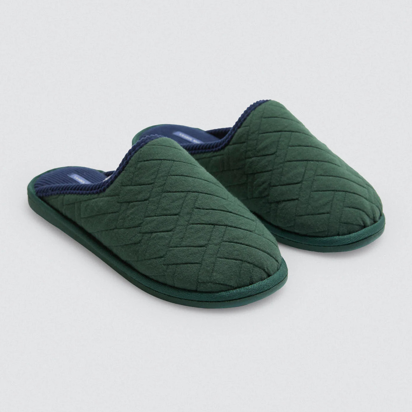 Pantofole in pelliccia con stampa etnica