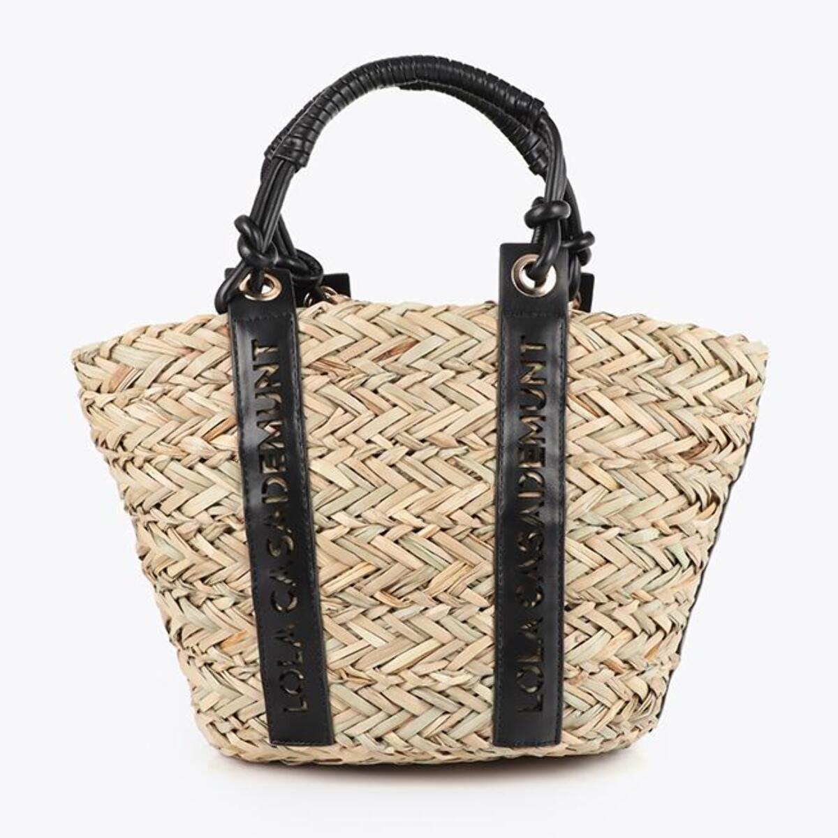 Mini cestino con dettaglio del logo fustellato sul manico