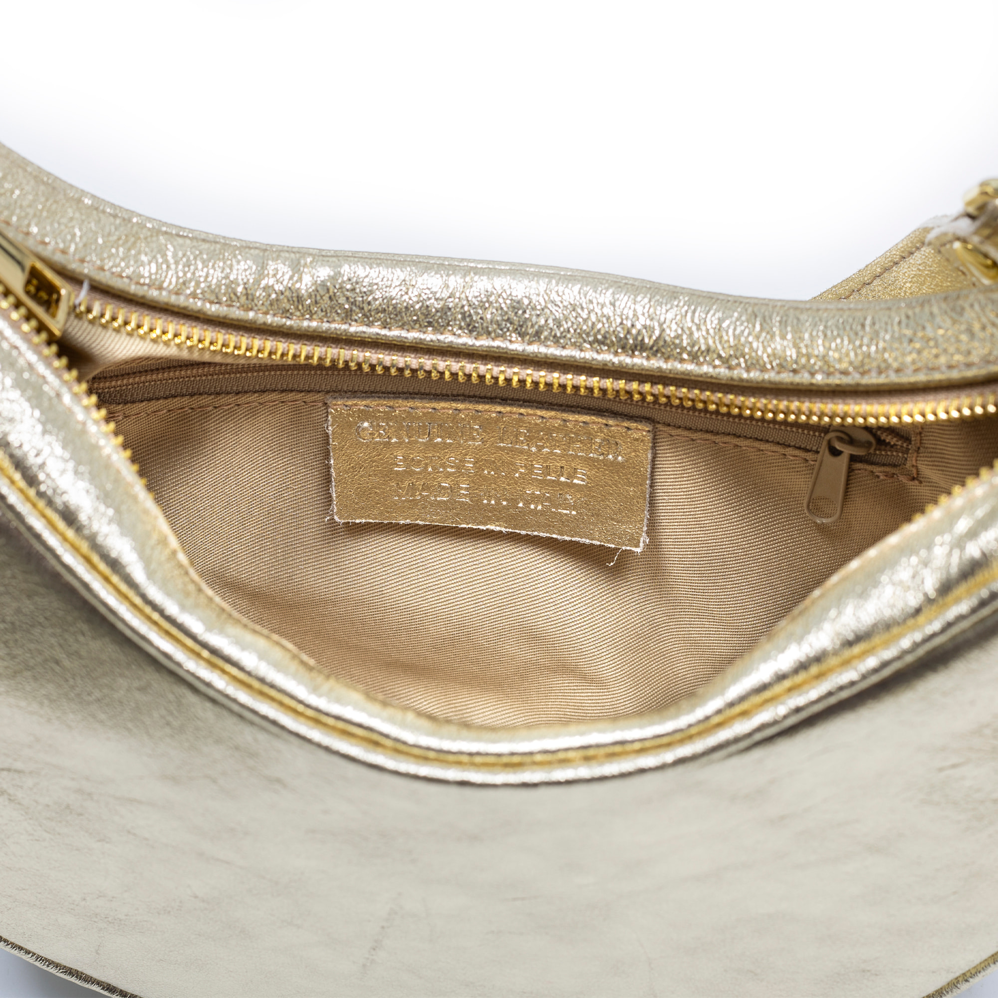 Asís borsa a tracolla e a mano, in pelle autentica con finitura scamosciata laminata, con design a mezzaluna.