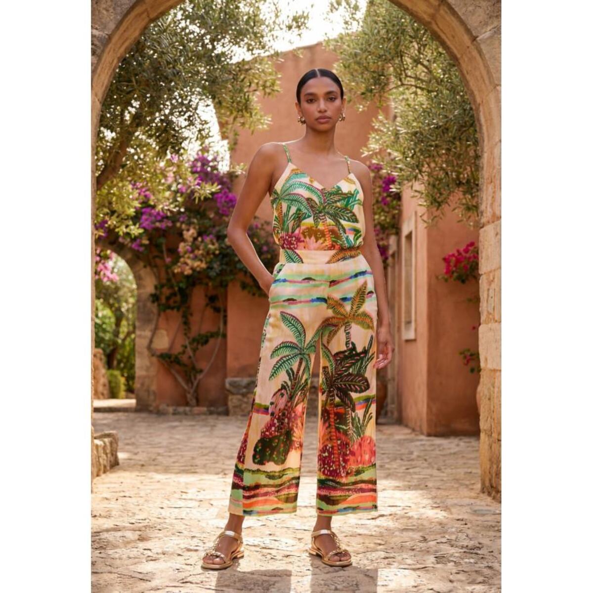 Top in pizzo con stampa di palme multicolore