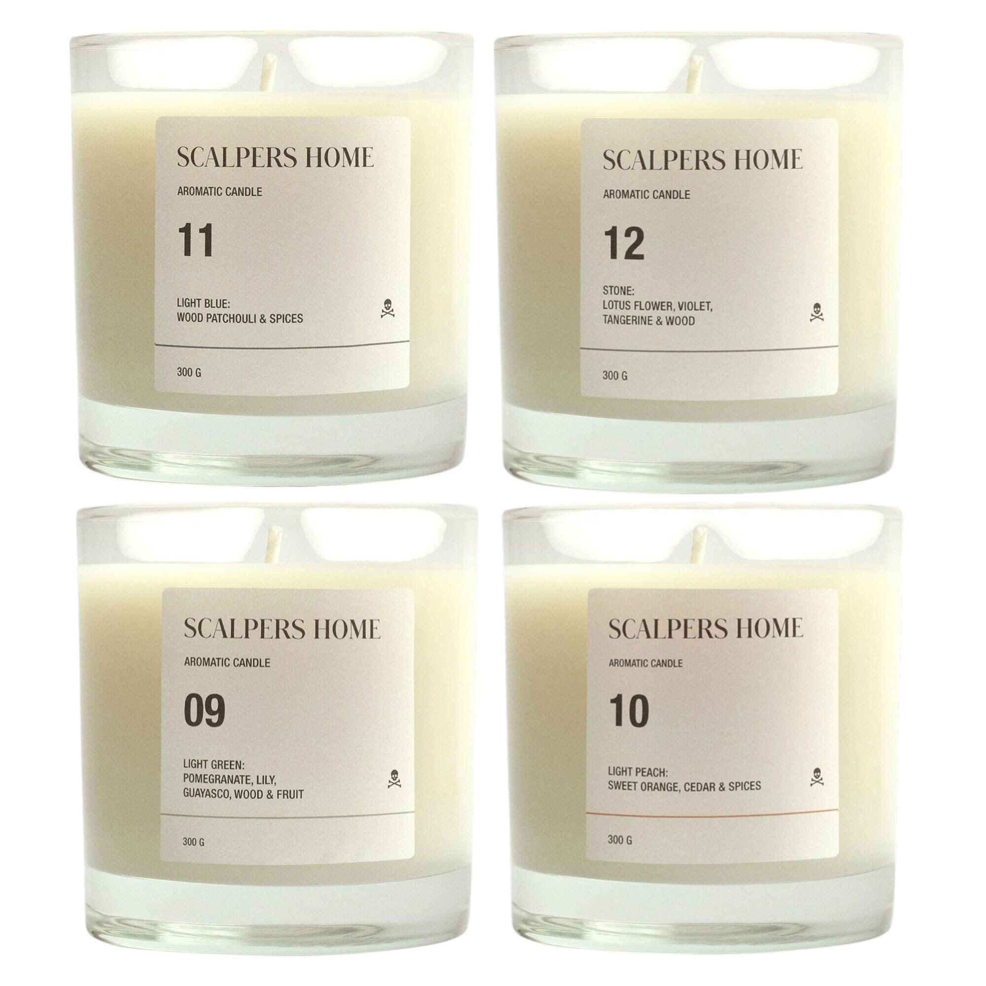Set de 4 velas aromáticas de 300gr con aromas de light green, white lotus, light peach y stone scalpers