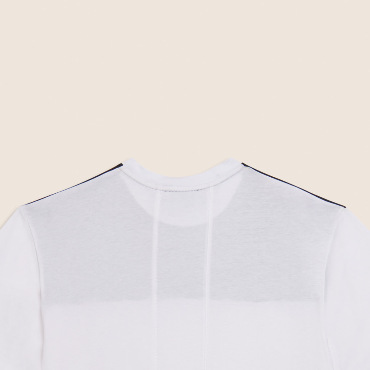 T-shirt con stampa fantasia e taschino zippato