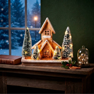 Casa navideña de madera con led blanco cálido y 4 árboles nevados, temporizador 6h 32x9x27 cm