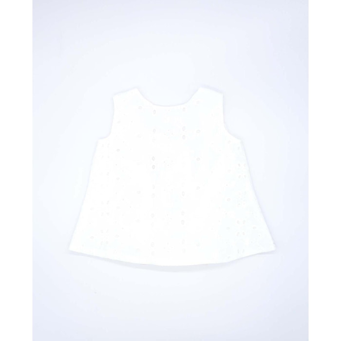 Blusa de batista bordada blanca, con lazo para atar en la espalda.