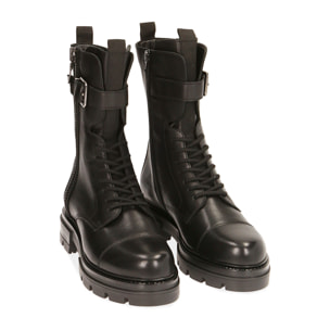 Botas militares de piel negra, tacón de 4 cm.