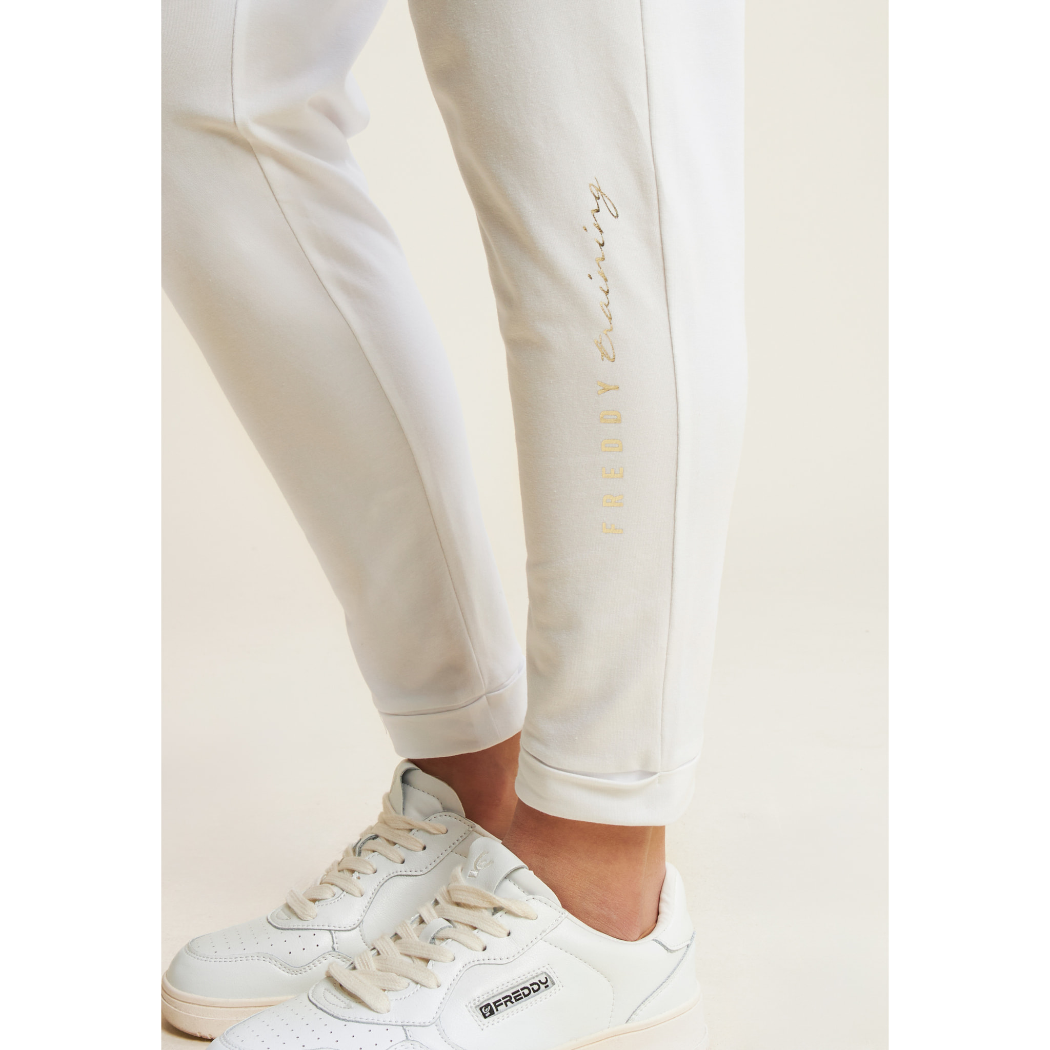 Pantaloni sportivi lunghezza 7/8 con risvolto
