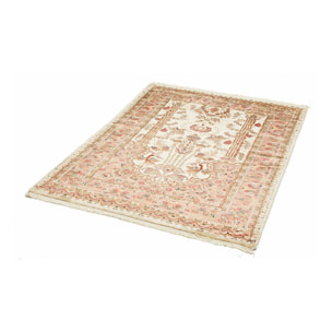 Authentique tapis d'orient, noué à la main en laine et soie