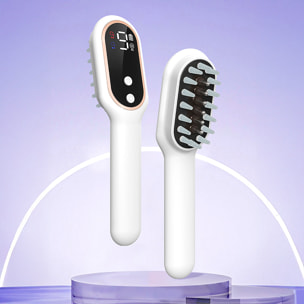 Pettine medico con trattamento di luminoterapia e massaggio a 9 intensità.