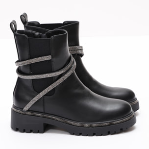 Stivaletti in simil pelle con applicazioni argentate