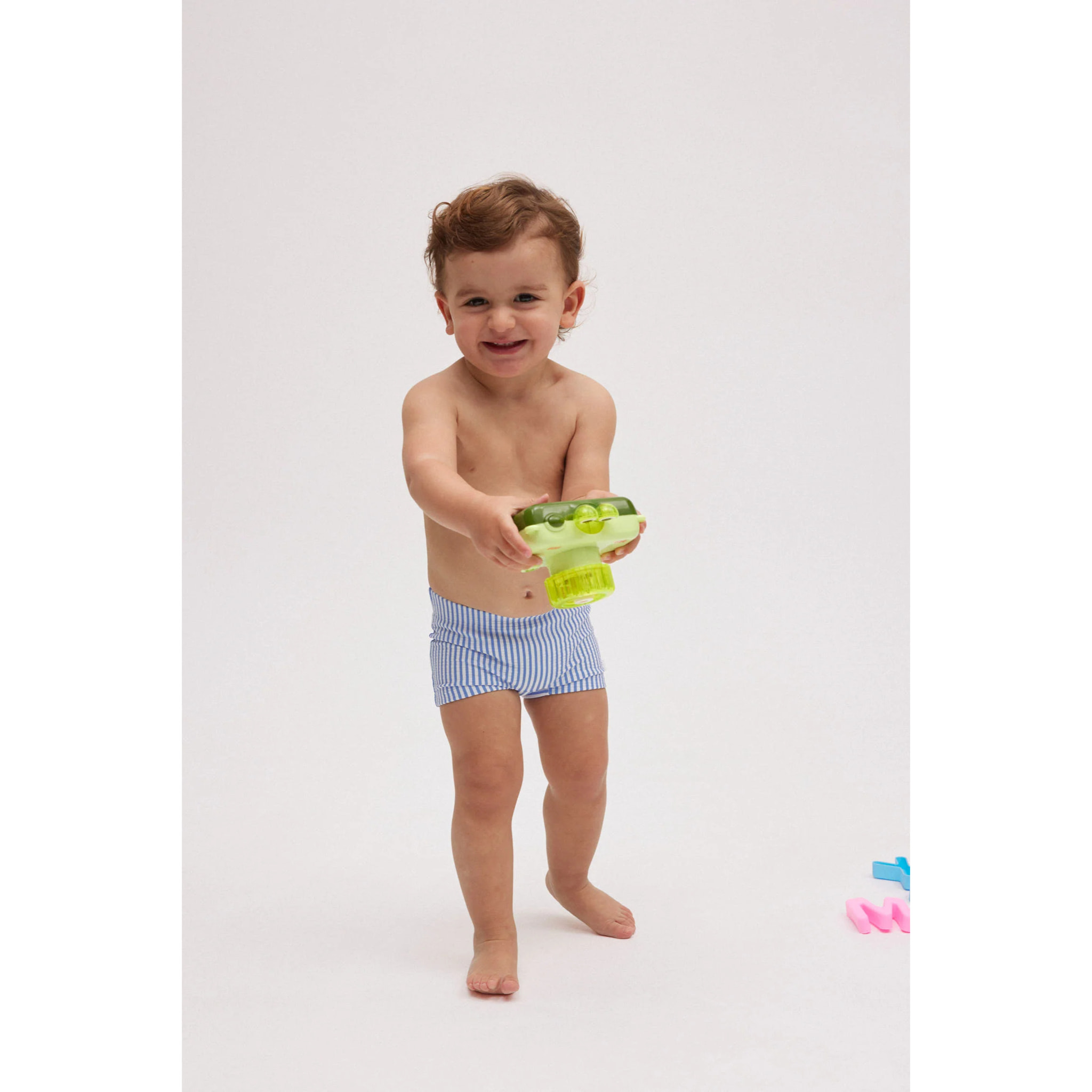 Costume da bagno boxer da neonato testurizzato a righe blu