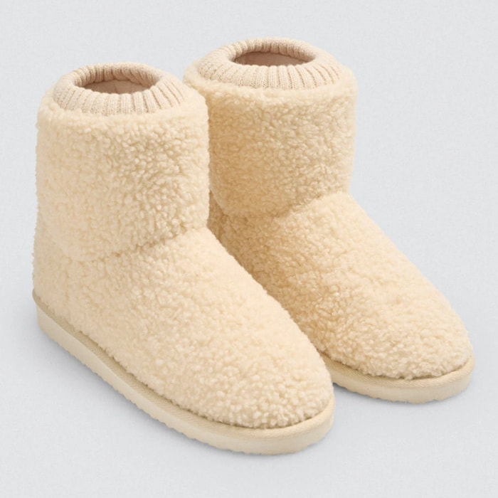 Stivali da casa con chiusura aderente in pelle di pecora e coste