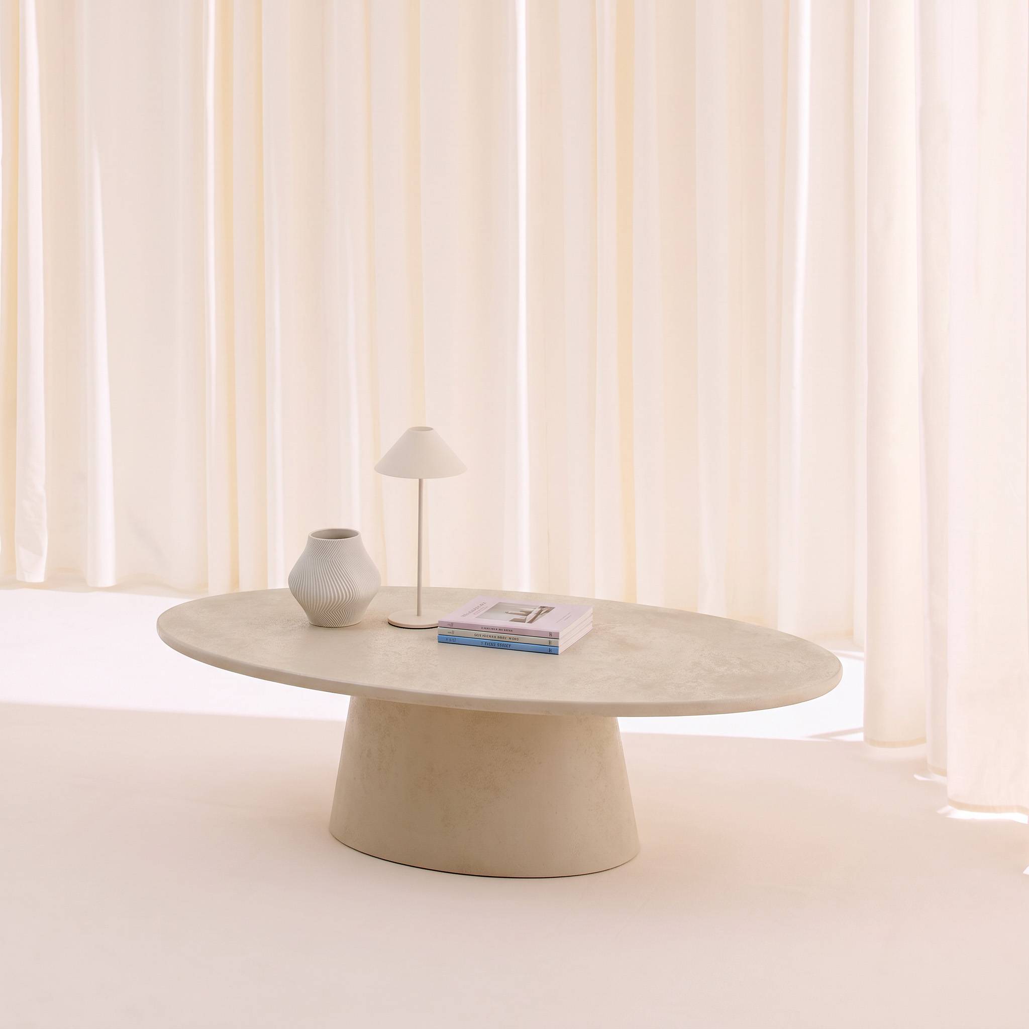 Table basse ovale finition effet béton NELL