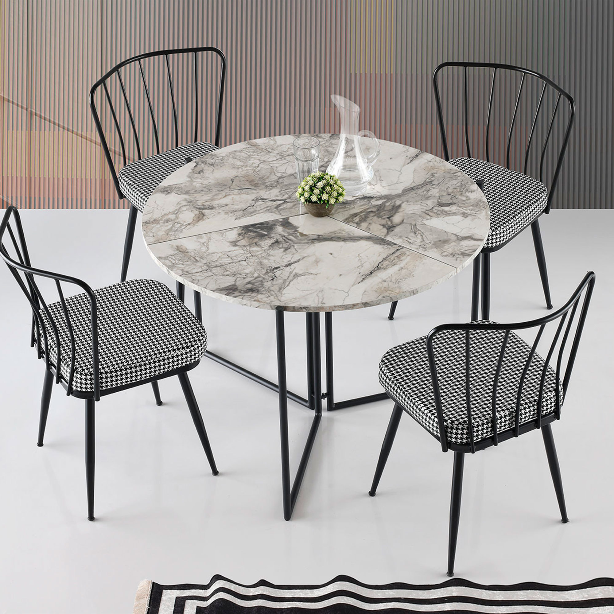 Mesa de comedor redonda con patas de metal wellhome.