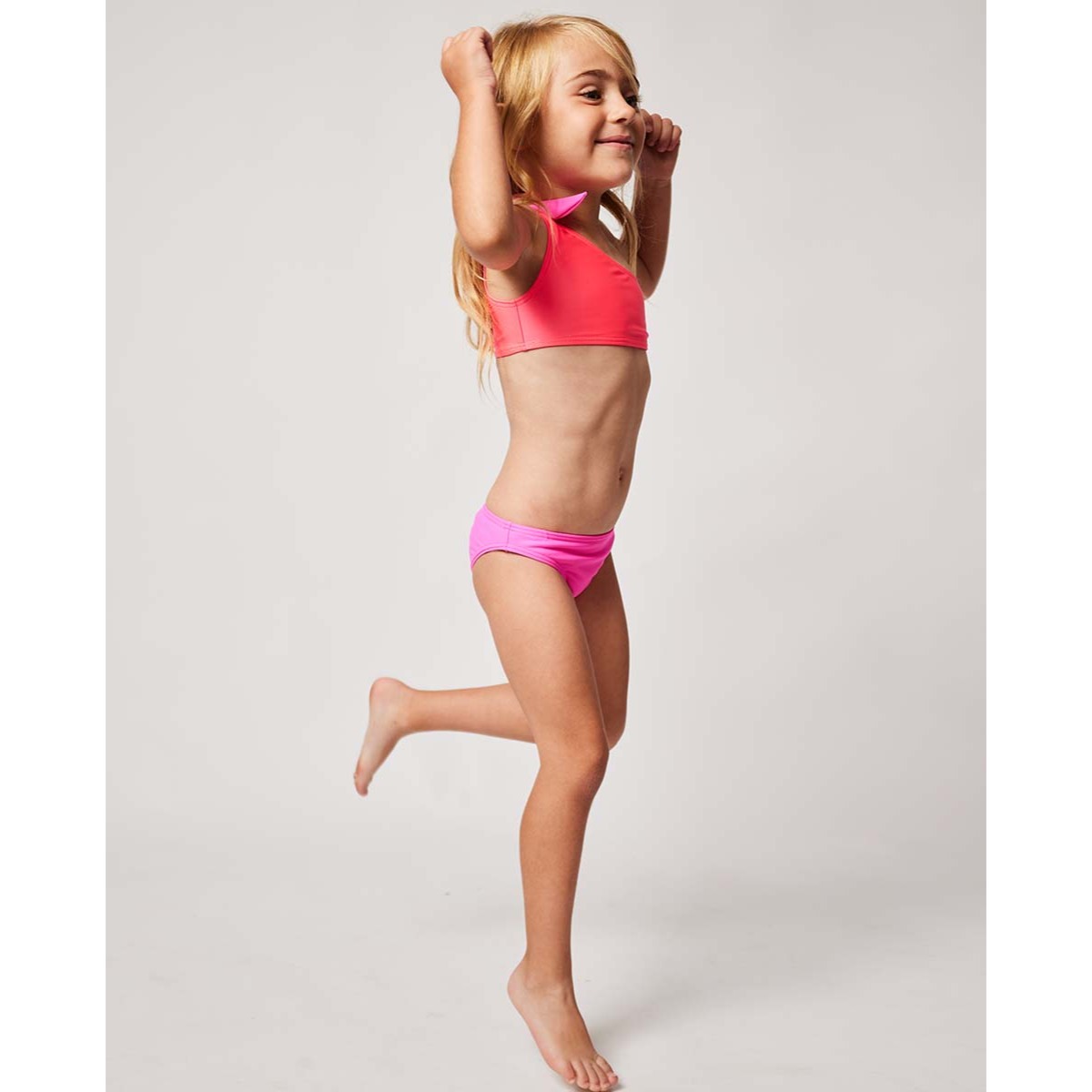 BIKINI ASIMETRICO FUCSIA Y CORAL