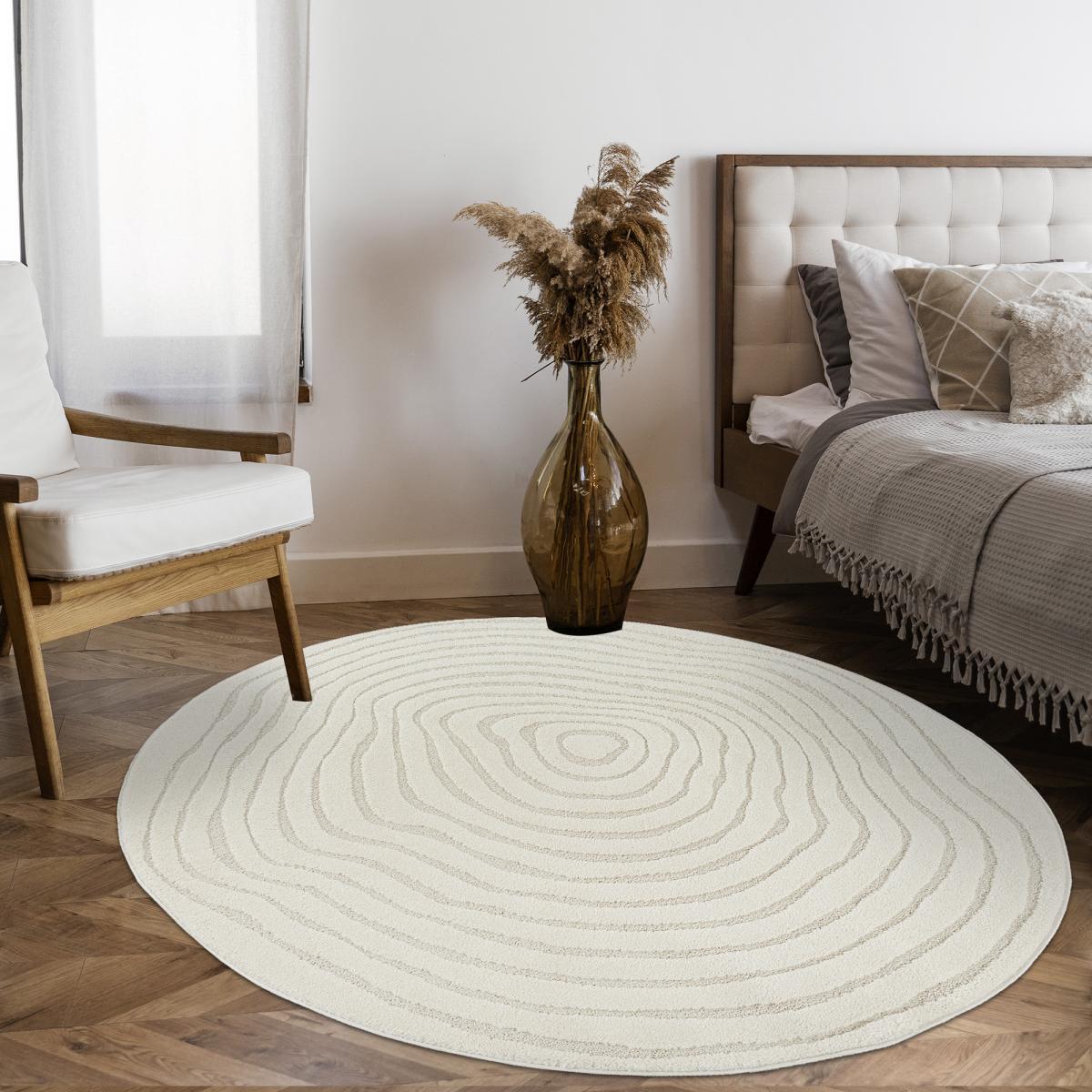 Tapis rond tendance ton sur ton aux motifs simples et à la forme originale