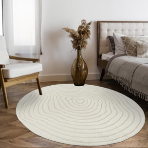 Tapis rond tendance ton sur ton aux motifs simples et à la forme originale