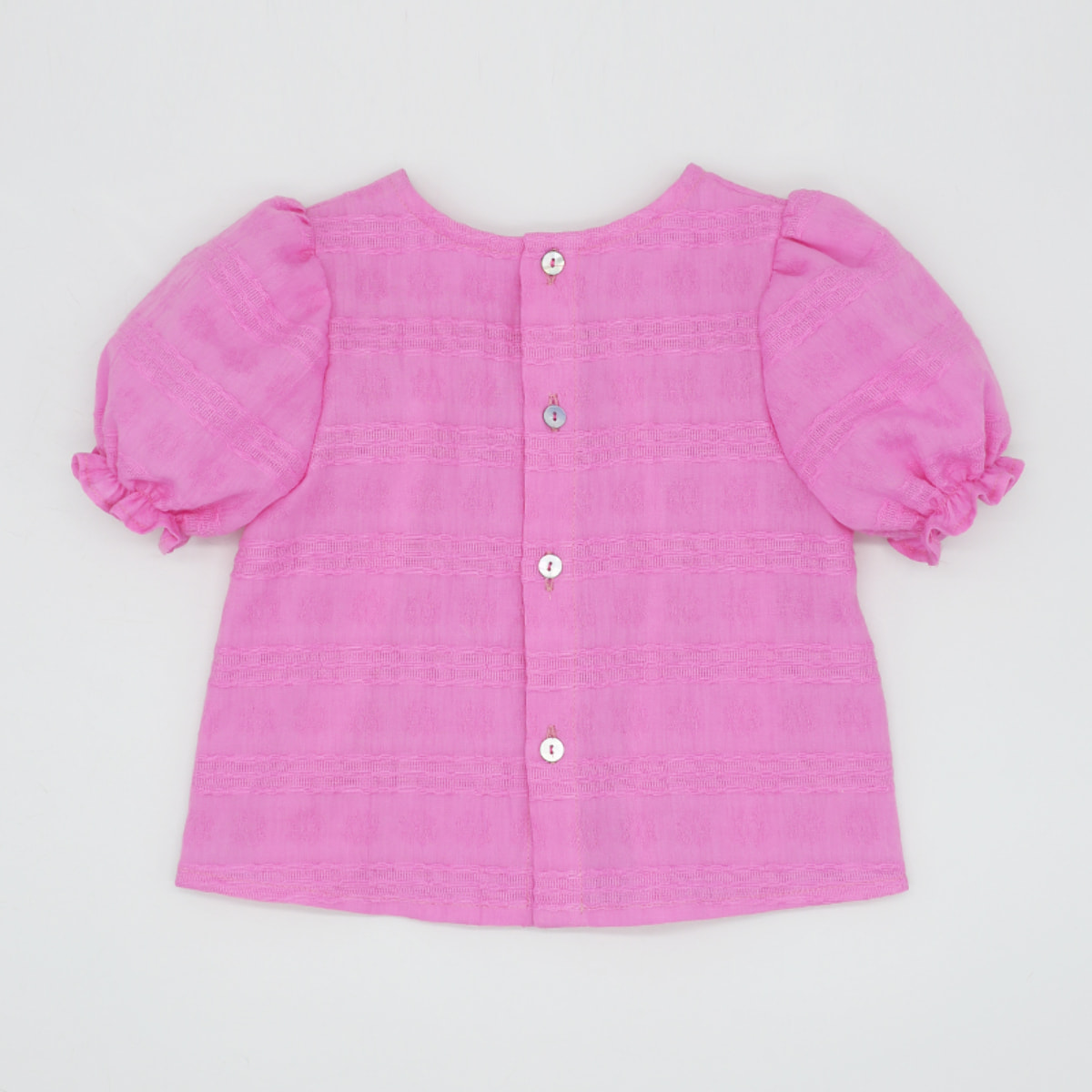 BLUSA VOILE ROSA FUCSIA CON MANGA ABULLONADA