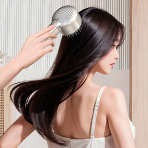 Pettine atomizzatore con massaggio a due velocità e base.