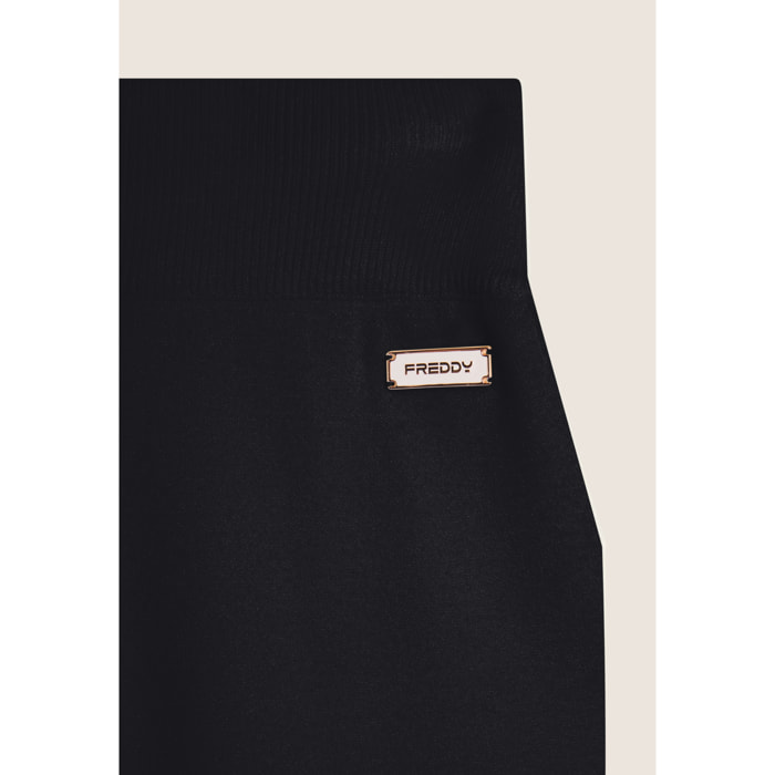 Pantalone in maglia tricot rasata con gamba larga