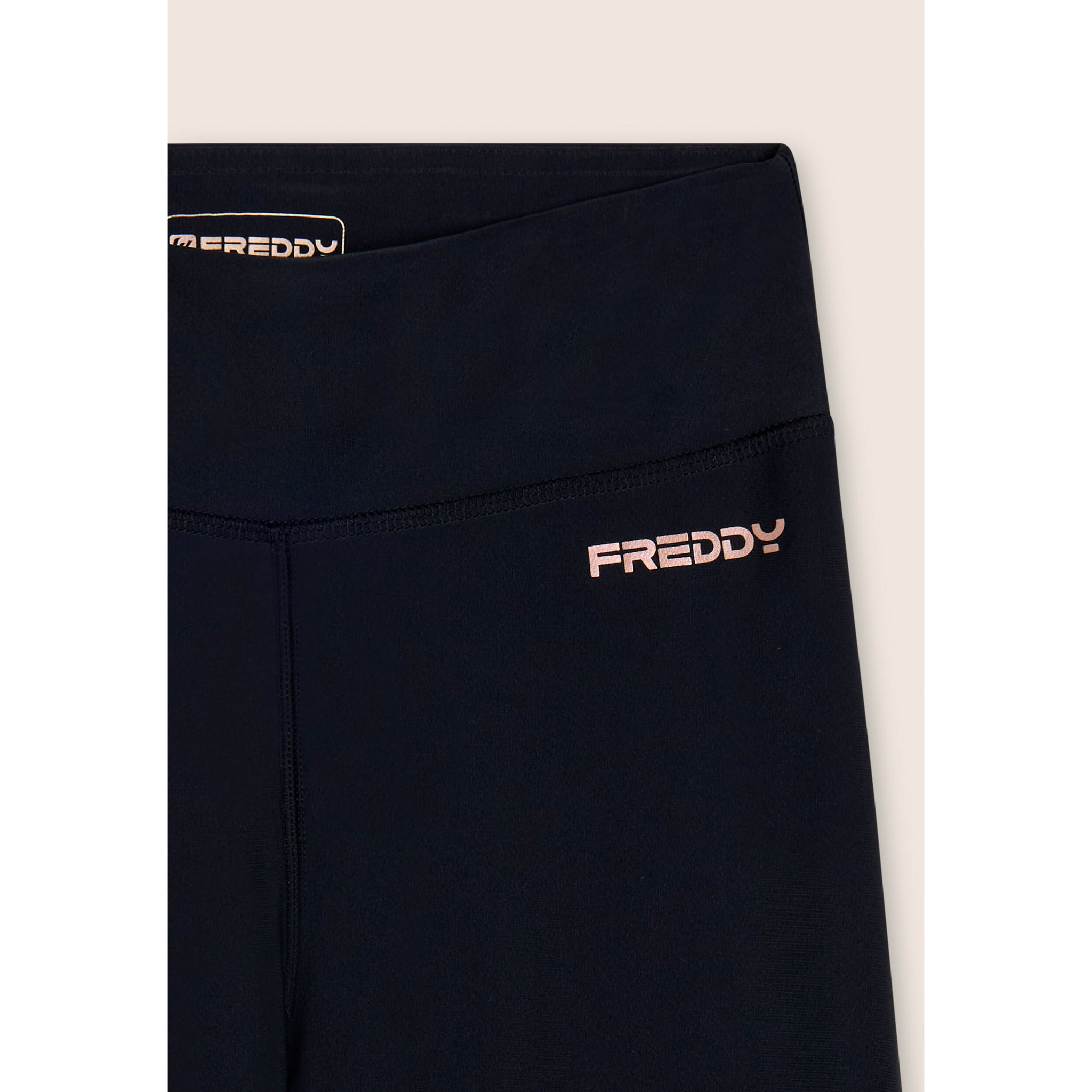 Leggings sportivi a zampa con vita alta e tasca interna