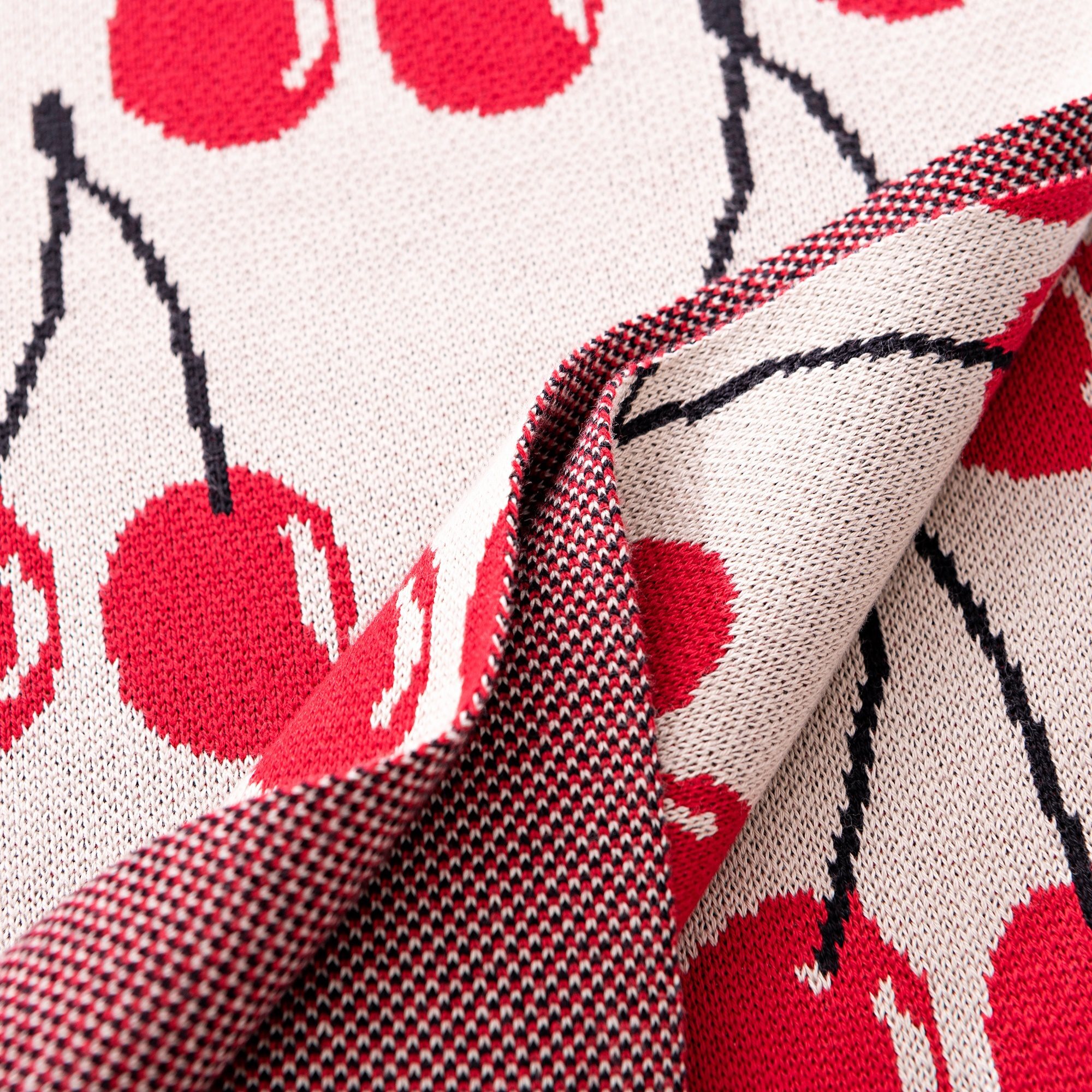 Manta 140x190cm 1000gr 100%acrilico crema con cerezas rojas benetton fruits