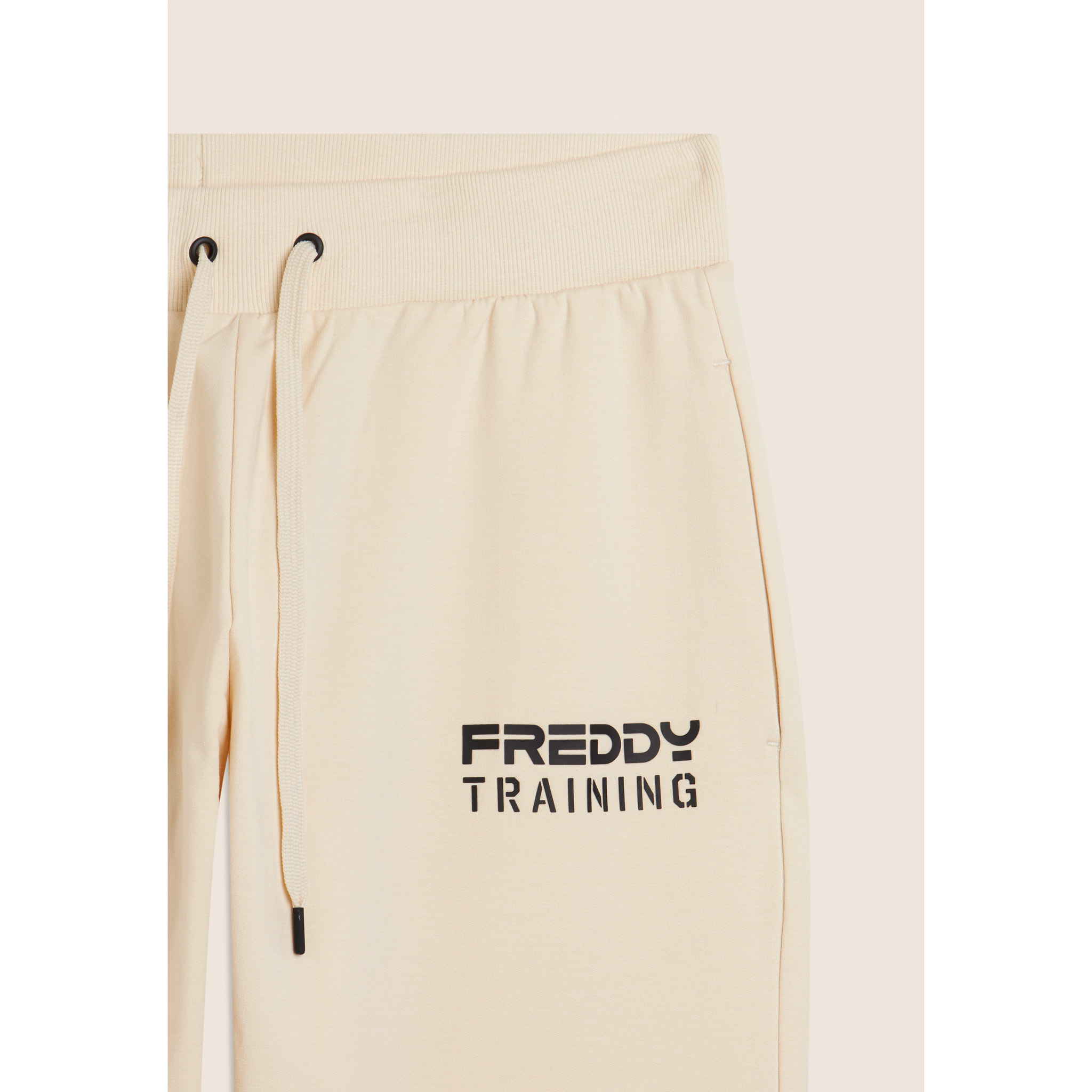 Pantaloni slim cropped con fondo in costina