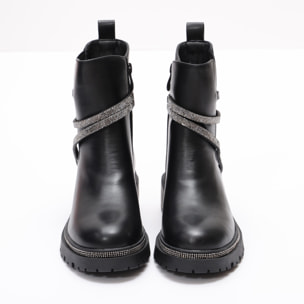 Stivaletti in simil pelle con applicazioni argentate