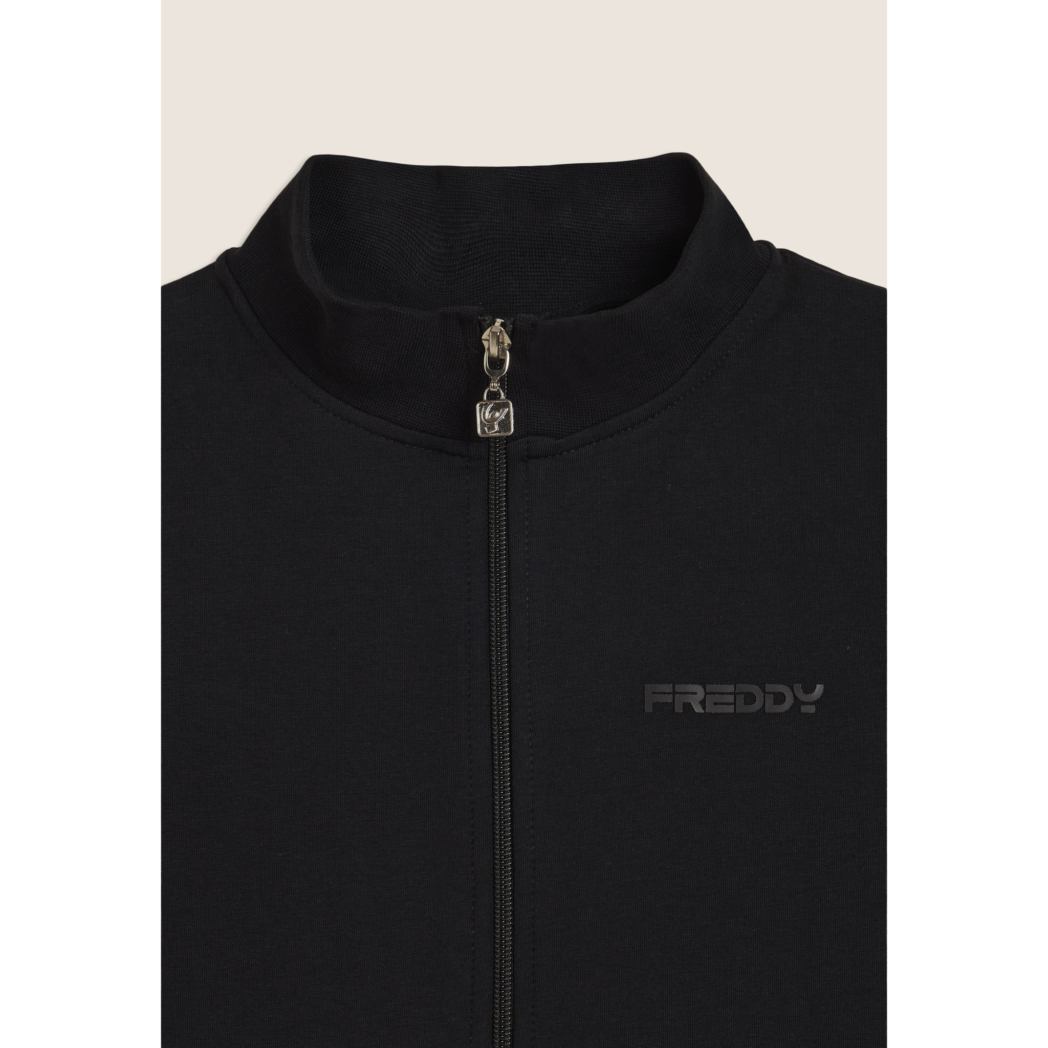 Tuta Junior full-zip con collo alto e tasche a marsupio