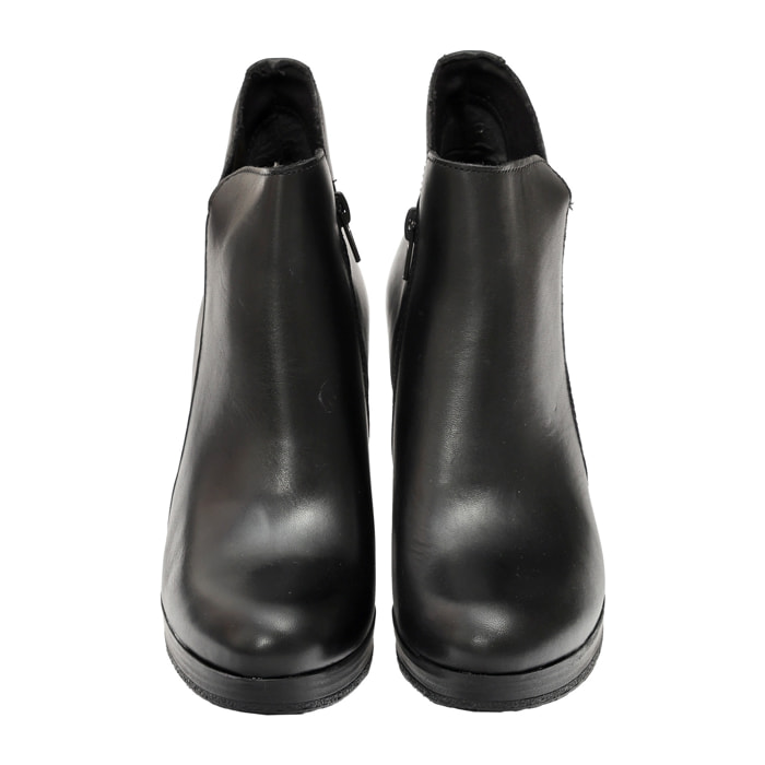 Tronchetto in vera pelle con tacco e plateaux