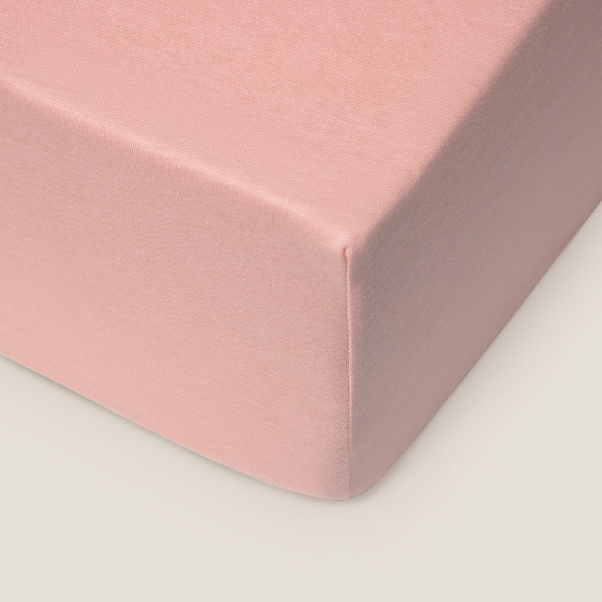 Sábana bajera de algodón de punto ajustable Kinbi color rosa Punto de algodón
