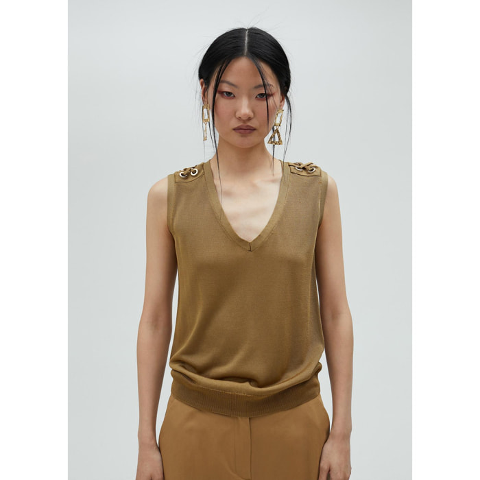Top in maglia con occhielli