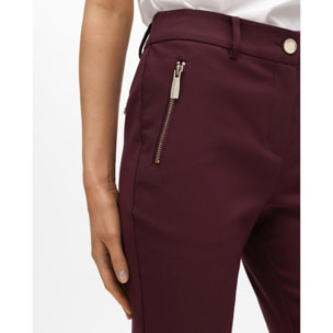 Pantaloni con tasche con zip in tessuto elastico