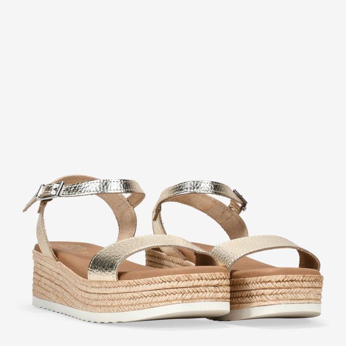 Sandalias doradas en piel con cuña efecto esparto