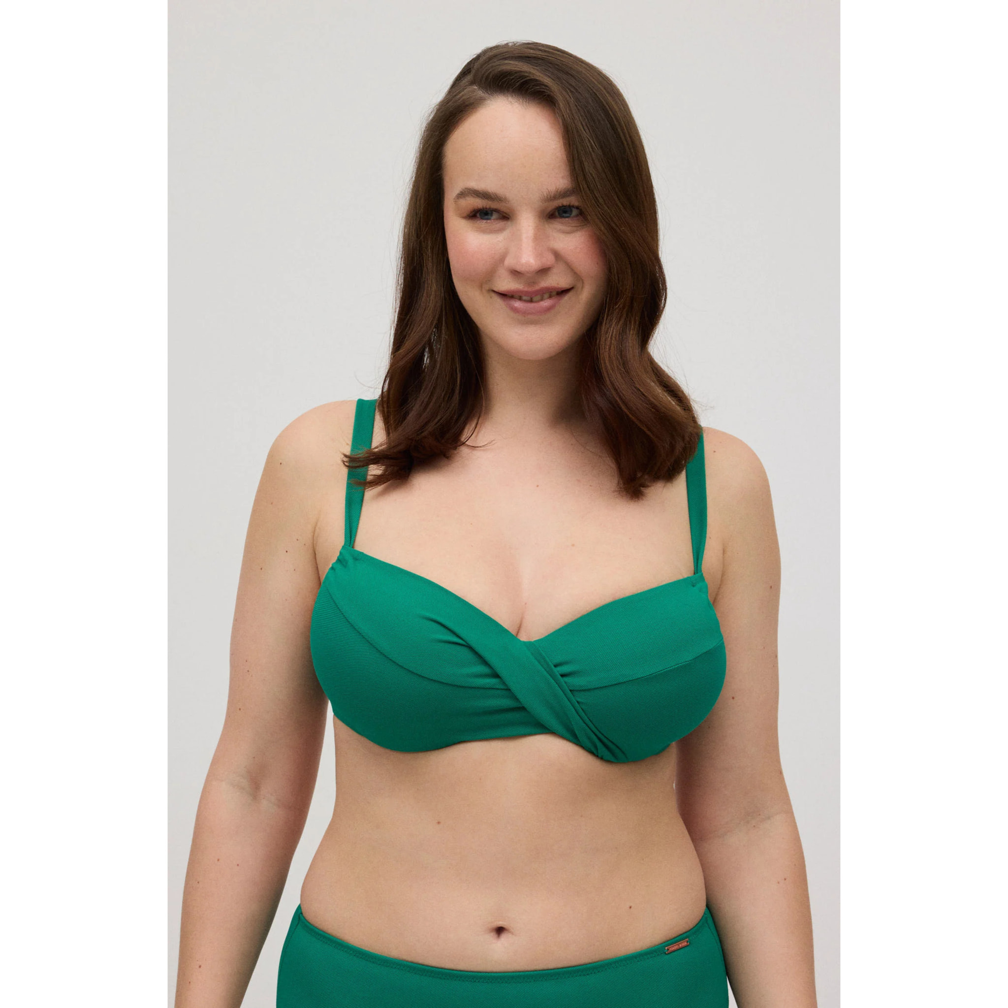 Top bikini riducente in micropiqué verde per coppe C e D