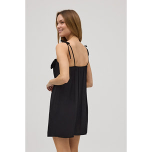 Abito corto con spalline annodate e dettaglio fiore nero