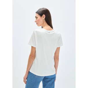 T-shirt con stampa animalier e palme