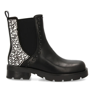 Bota chelsea con tachuelas brillantes