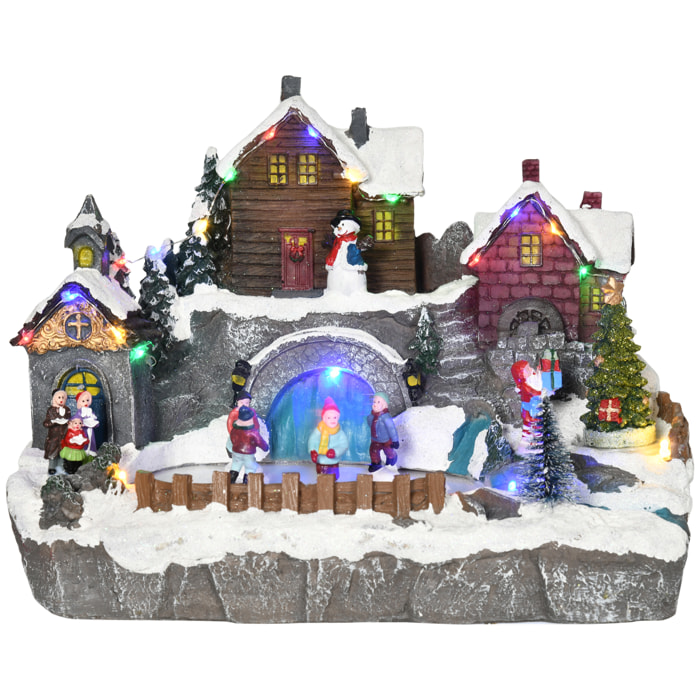 HOMCOM Pueblo Navideño Escena Navideña Iluminado con Luces LED Árbol Giratorio y Pista de Patinaje Decoración Navideña sobre Mesa 32x25,5x24 cm Multicolor