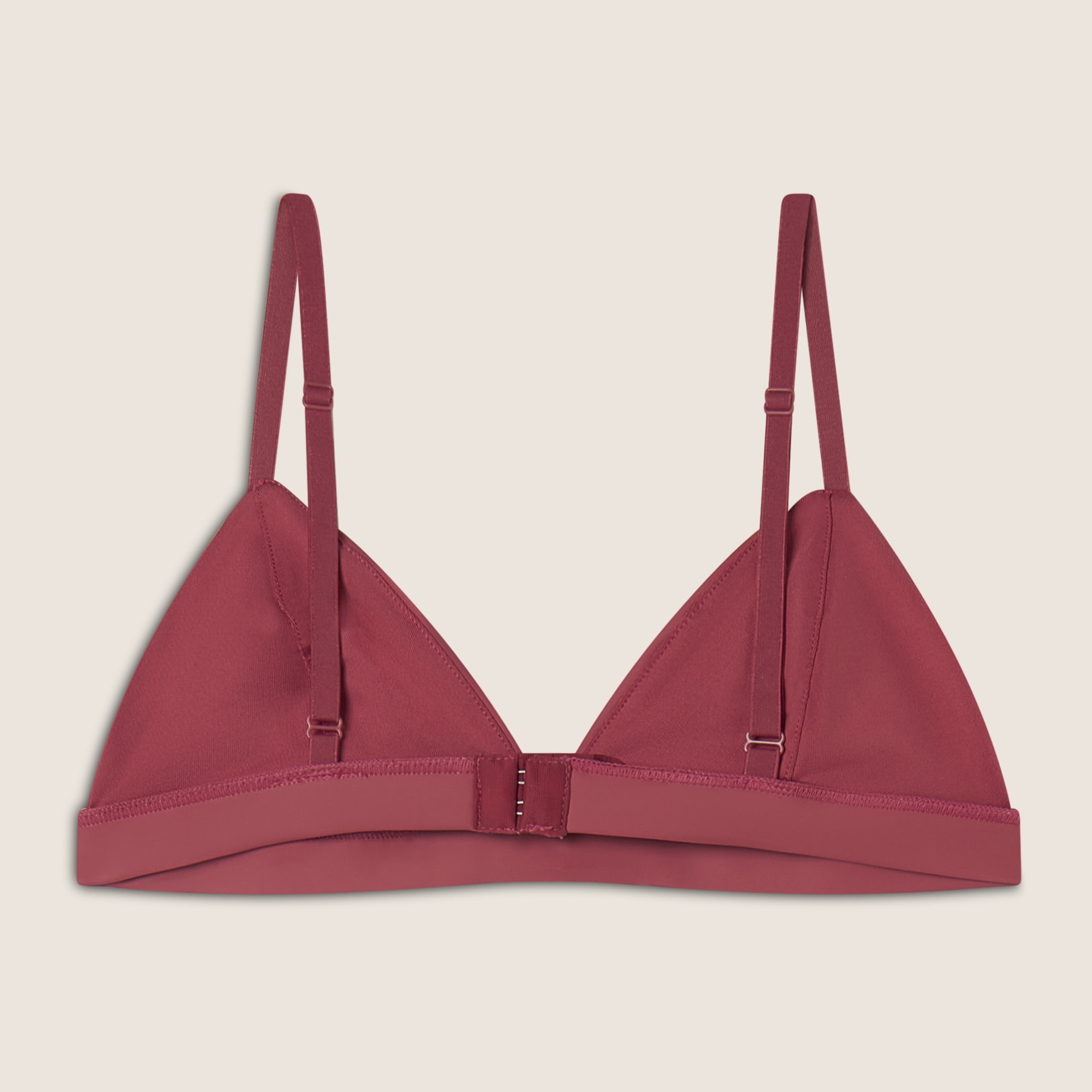 Top a triangolo in similpelle laminata