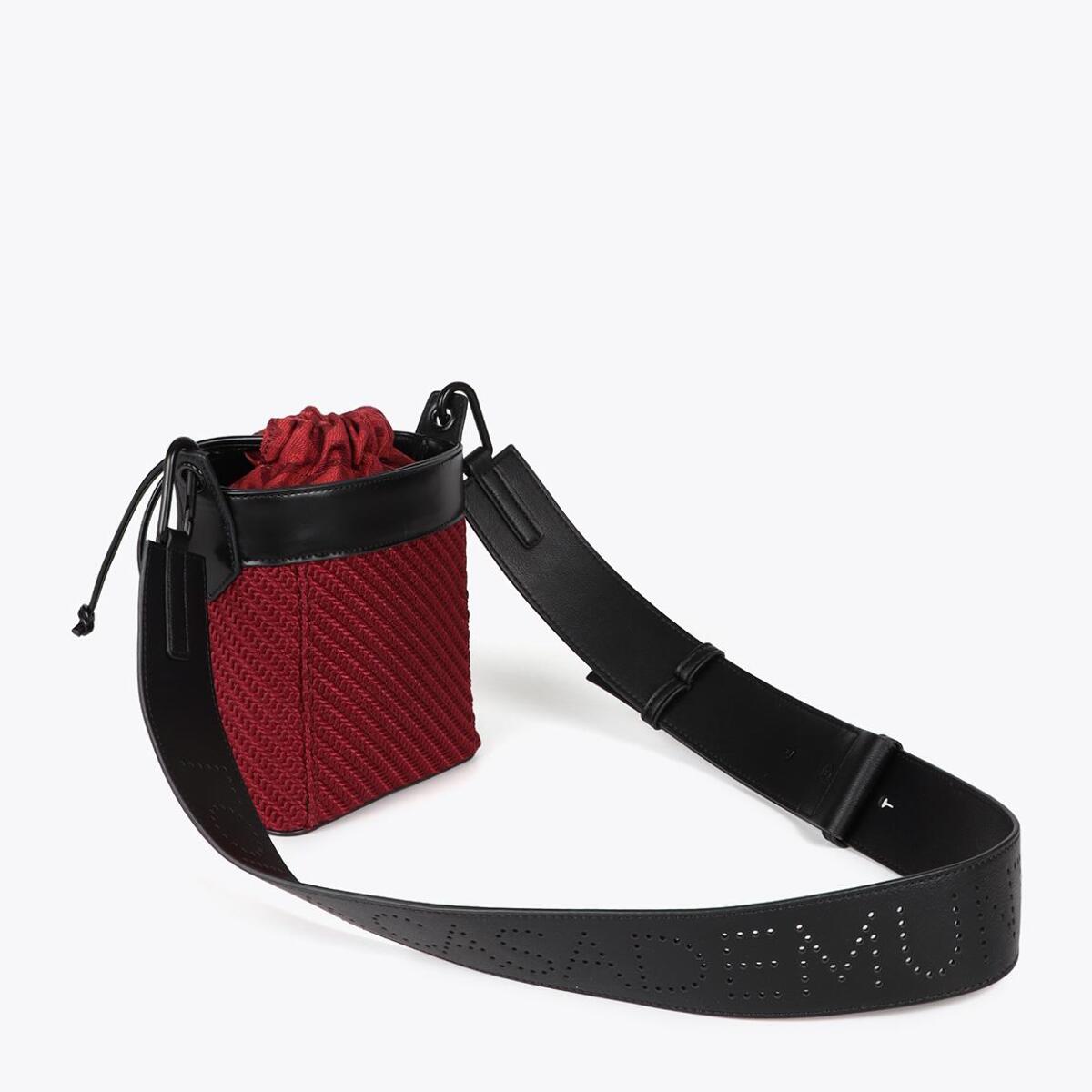 Borsa a tracolla combinata in tessuto e similpelle