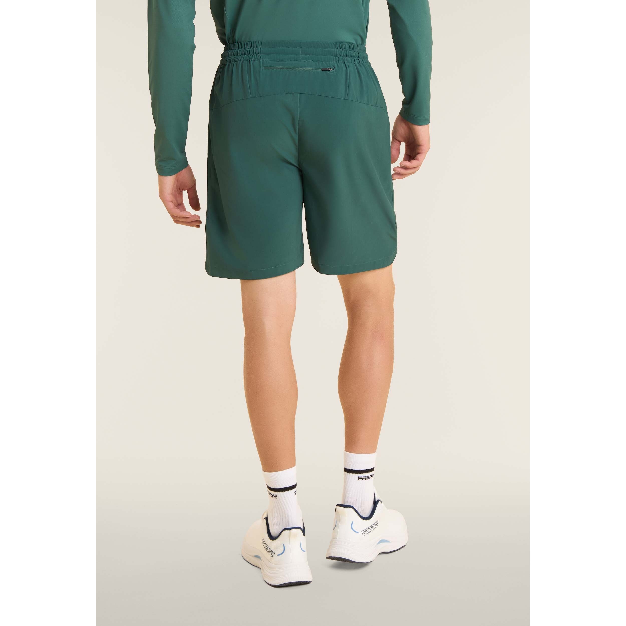 Shorts slim con tasche zip e coulisse in vita